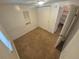 View of cozy bedroom featuring neutral paint, carpet, window, and closet space at 444 S Jersey St, Denver, CO 80224