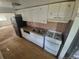 View of bright kitchen featuring linoleum flooring, neutral paint, and white cabinets at 444 S Jersey St, Denver, CO 80224