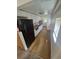 View of bright kitchen featuring linoleum flooring, neutral paint, and white cabinets at 444 S Jersey St, Denver, CO 80224