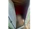This storage room features red-painted walls and exposed wood at 444 S Jersey St, Denver, CO 80224