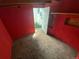 This storage room features red-painted walls and exposed wood at 444 S Jersey St, Denver, CO 80224