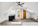 This bedroom features carpeted floors, two skylights, a vanity and a ceiling fan, and is painted white at 3375 W 37Th Ave, Denver, CO 80211