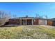 House backyard view with covered patio at 323 Fulton St, Aurora, CO 80010