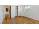 Bedroom with hardwood floors and mirrored closet at 323 Fulton St, Aurora, CO 80010