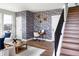 Home office with geometric wallpaper and stylish desk at 10864 Lyric St, Lone Tree, CO 80134