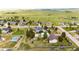 Expansive aerial view features a home on a sprawling lot with mature trees and ample outdoor space at 5685 Columbine Ridge Rd, Elizabeth, CO 80107