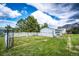 Large, fenced backyard includes a utility shed and ample green space for outdoor activities at 5685 Columbine Ridge Rd, Elizabeth, CO 80107