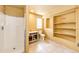 Unfinished basement bathroom with shower and shelving at 5685 Columbine Ridge Rd, Elizabeth, CO 80107