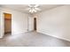 Spacious, neutral bedroom with carpet and two closets at 5685 Columbine Ridge Rd, Elizabeth, CO 80107