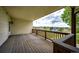 Spacious covered wood deck with views of the surrounding landscape provides outdoor living space at 5685 Columbine Ridge Rd, Elizabeth, CO 80107