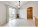 Bright dining area featuring sliding door access and tile flooring at 5685 Columbine Ridge Rd, Elizabeth, CO 80107