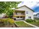 Two-story home with a walkout basement, backyard deck, and patio area at 5685 Columbine Ridge Rd, Elizabeth, CO 80107