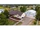 Charming ranch-style home featuring a large detached garage, manicured lawn, and white picket fence at 5685 Columbine Ridge Rd, Elizabeth, CO 80107