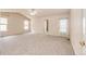 Spacious main bedroom boasting natural light and ample carpet flooring at 5685 Columbine Ridge Rd, Elizabeth, CO 80107