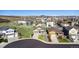 Aerial view showcases a lovely suburban home in a well-planned community on a sunny day at 5996 Sun Mesa Cir, Castle Rock, CO 80104