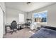 Bright bedroom featuring neutral walls and carpet with a large window offering a neighborhood view at 5996 Sun Mesa Cir, Castle Rock, CO 80104