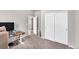 Bedroom featuring work area, large closet and neutral color palette at 5996 Sun Mesa Cir, Castle Rock, CO 80104