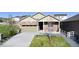 Charming single-story home with a well-manicured lawn and a welcoming covered front porch at 5996 Sun Mesa Cir, Castle Rock, CO 80104