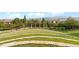 An outdoor amphitheater set in a grassy landscape for community gatherings in Solterra at 2236 S Isabell Ct, Lakewood, CO 80228
