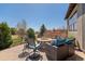 Outdoor fire pit area with comfortable seating, perfect for gatherings and enjoying the backyard view at 2236 S Isabell Ct, Lakewood, CO 80228