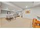 Finished basement featuring a ping pong table, dart board and a bar area at 2236 S Isabell Ct, Lakewood, CO 80228