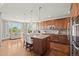 Inviting kitchen with a center island, stainless steel appliances, and lots of counter space at 2236 S Isabell Ct, Lakewood, CO 80228