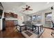 Living room with hardwood floors, built-ins, wet bar, and mountain views at 2236 S Isabell Ct, Lakewood, CO 80228