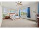 Spacious main bedroom with a vaulted ceiling, a large window, and comfortable furnishings at 2236 S Isabell Ct, Lakewood, CO 80228
