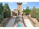 A captivating stone tower and tiered fountain create an inviting ambiance at the Solterra community clubhouse at 2236 S Isabell Ct, Lakewood, CO 80228