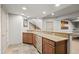 Basement wet bar with granite countertops and stainless steel appliances at 2236 S Isabell Ct, Lakewood, CO 80228