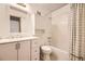 Bright bathroom featuring white vanity and shower with tub at 2469 S Xanadu Way # A, Aurora, CO 80014