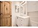 Renovated bathroom with white vanity and stylish fixtures at 2469 S Xanadu Way # A, Aurora, CO 80014