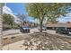 Well-maintained parking area surrounded by trees at 2469 S Xanadu Way # A, Aurora, CO 80014
