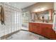 Elegant bathroom features double vanity, a glass block shower and lots of natural light at 236 E Fair Ln, Centennial, CO 80121