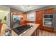Well-appointed kitchen featuring stainless steel appliances, wooden cabinets, granite countertops, and great natural light at 236 E Fair Ln, Centennial, CO 80121
