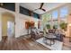 Spacious living room featuring high ceilings, an open floor plan, and great natural light at 236 E Fair Ln, Centennial, CO 80121