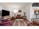 Bright living room with hardwood floors and modern decor at 236 E Fair Ln, Centennial, CO 80121