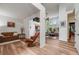 Spacious living room with high ceilings, large windows, and an open floor plan at 236 E Fair Ln, Centennial, CO 80121