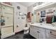 Bathroom with a glass shower and black tile floor at 30544 The Golf Club Point, Evergreen, CO 80439