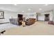 Living room with plenty of seating and a large tv at 30544 The Golf Club Point, Evergreen, CO 80439