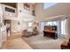 Bright living room featuring vaulted ceilings, natural light, and elegant décor at 20341 E 48Th Pl, Denver, CO 80249