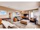 Cozy living room with warm lighting, comfortable sofas, and stylish decor, creating a welcoming atmosphere at 20341 E 48Th Pl, Denver, CO 80249
