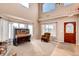 Inviting living room with tall ceilings and windows providing plenty of natural light at 20341 E 48Th Pl, Denver, CO 80249