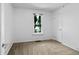 Bedroom with a window view at 3319 Newton St, Denver, CO 80211