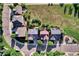 Aerial view of neighborhood homes featuring large back yards and well-kept greenery at 8489 S Quay St, Littleton, CO 80128