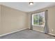 A view of the bedroom featuring carpet floors and natural light at 8489 S Quay St, Littleton, CO 80128