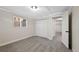 Basement bedroom featuring carpeting and a double door closet at 2646 S Pagosa Way, Aurora, CO 80013