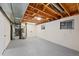 Spacious unfinished basement featuring concrete floors, exposed ceilings and plenty of room for storage or customization at 2646 S Pagosa Way, Aurora, CO 80013