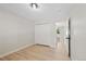 A bedroom with a double door closet and light wood flooring at 2646 S Pagosa Way, Aurora, CO 80013