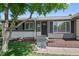 Charming home featuring a well-maintained front yard and a welcoming front door with updated address plate at 2646 S Pagosa Way, Aurora, CO 80013